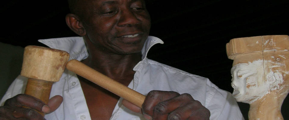 Richard Faye Carving a statue